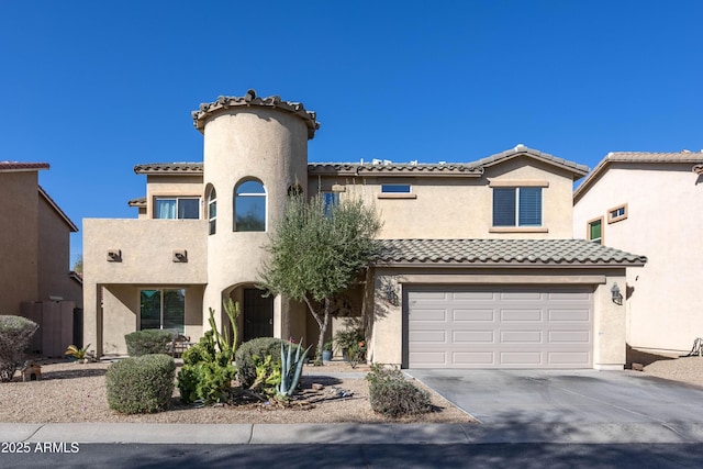 mediterranean / spanish-style house featuring a garage