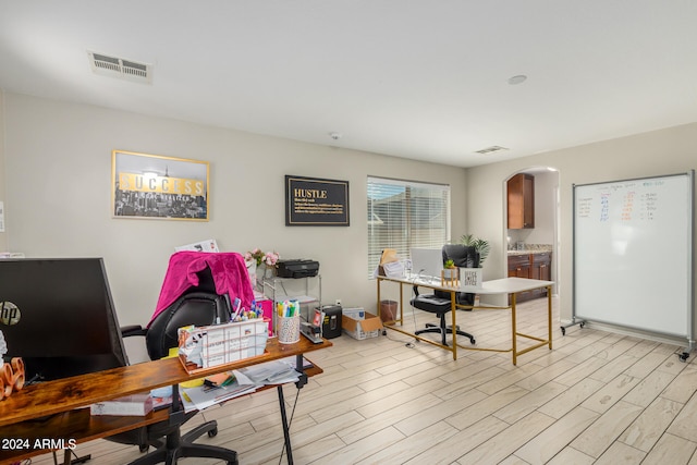 office area featuring light wood-type flooring