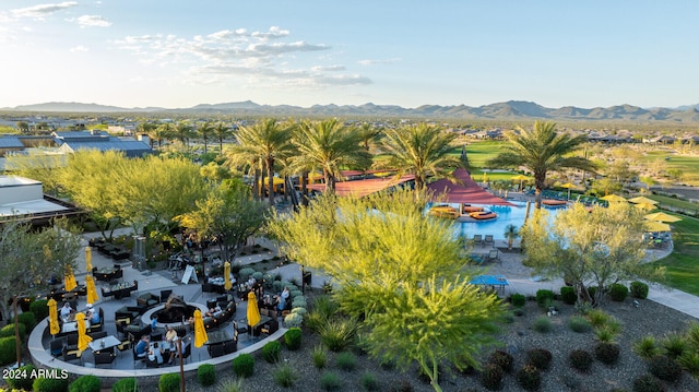 birds eye view of property featuring a mountain view