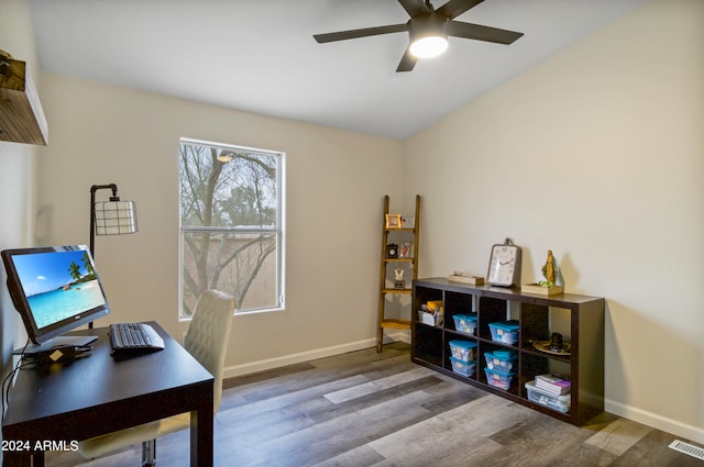 office featuring dark hardwood / wood-style floors and ceiling fan