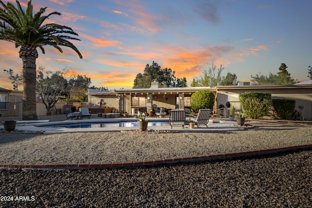 view of front of property featuring a patio