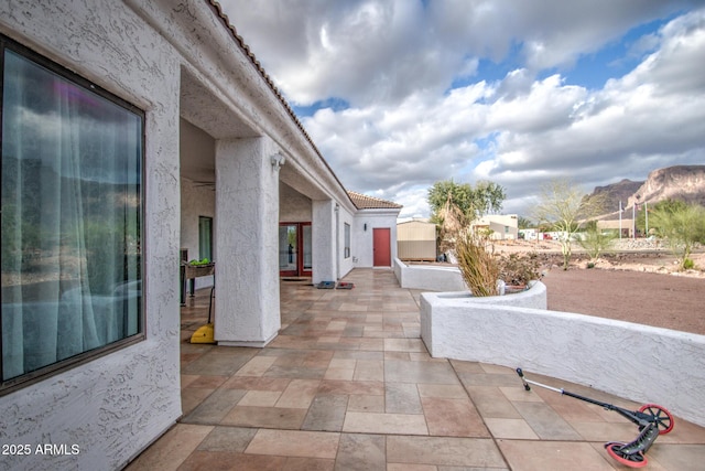 view of patio with a mountain view