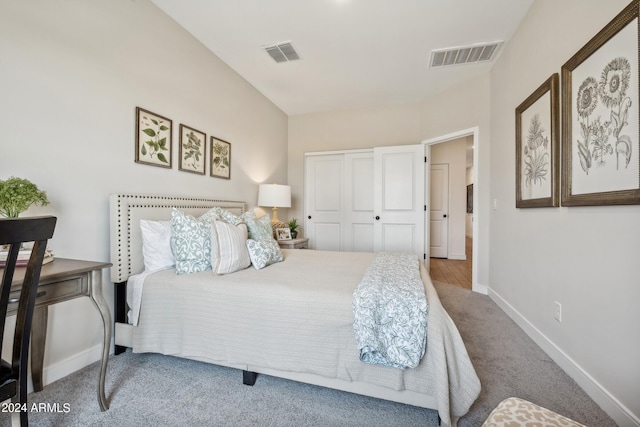 bedroom featuring a closet and carpet