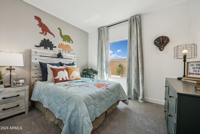 bedroom featuring dark colored carpet