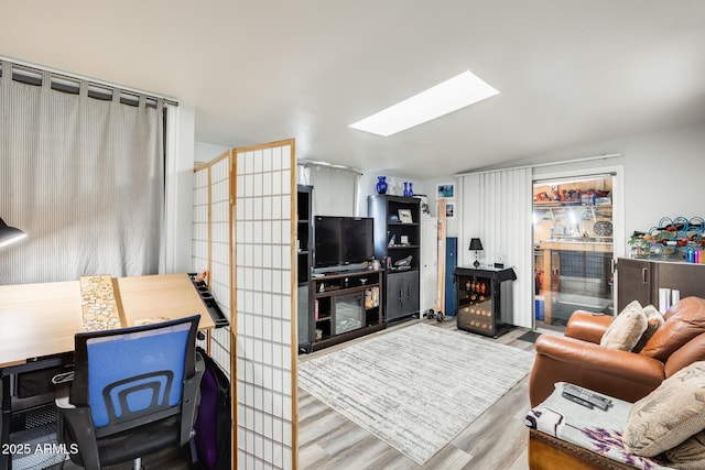 10374 W Deanne Dr, Sun City, AZ 85351 - living room featuring wood finished floors and a skylight