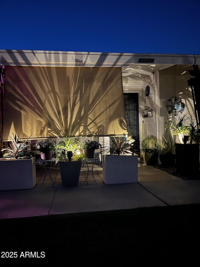 10374 W Deanne Dr, Sun City, AZ 85351 - view of patio at twilight