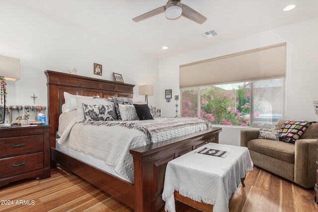 bedroom featuring ceiling fan and light hardwood / wood-style flooring