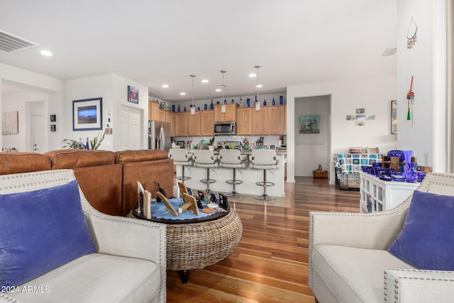 living room with hardwood / wood-style floors