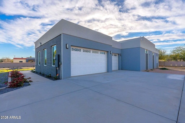 view of property exterior featuring a garage