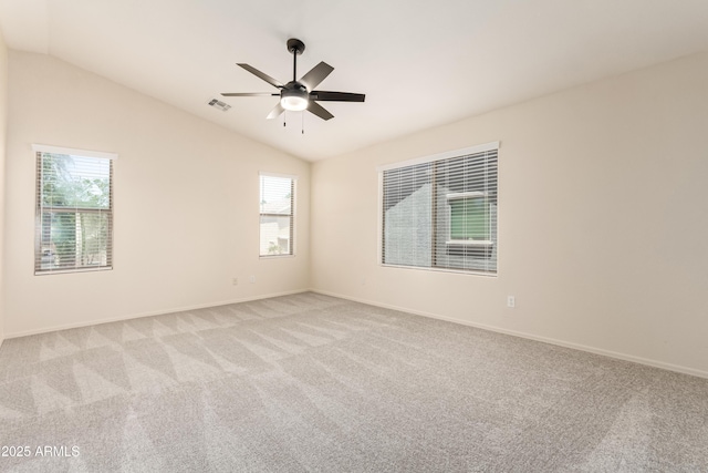 11834 N 147th Ln, Surprise, AZ 85379 - spare room with vaulted ceiling, healthy amount of natural light, ceiling fan, light colored carpet, and baseboards