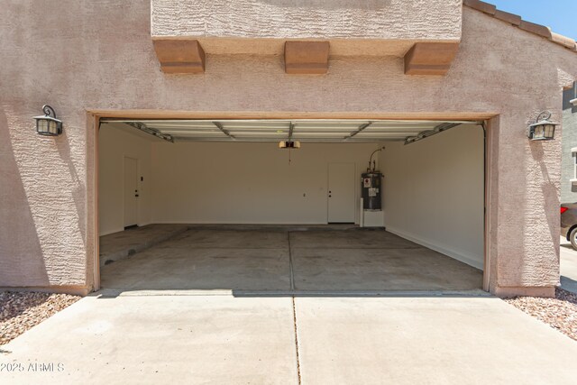 11834 N 147th Ln, Surprise, AZ 85379 - garage with water heater, driveway, and a garage door opener