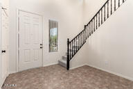 11834 N 147th Ln, Surprise, AZ 85379 - foyer featuring stairway and baseboards