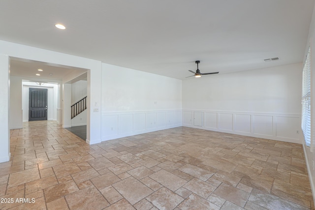 spare room featuring ceiling fan