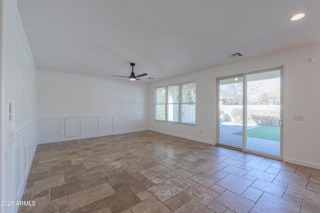 spare room featuring ceiling fan