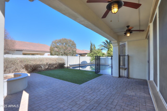 view of patio with ceiling fan