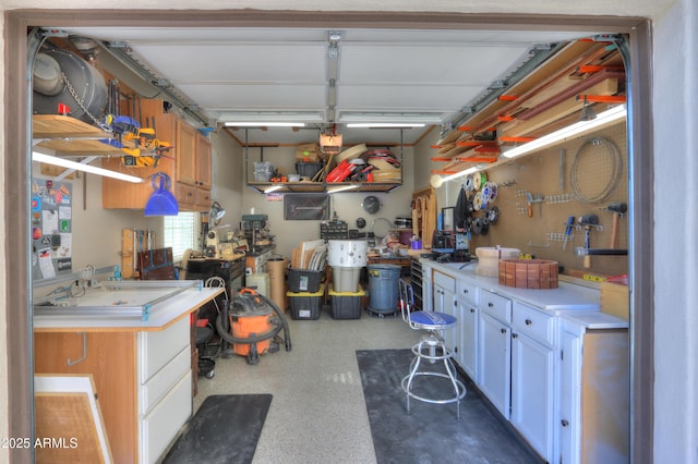 garage with a workshop area