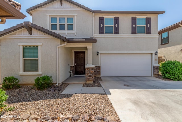 view of front of property with a garage