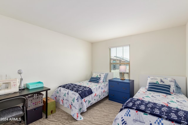 bedroom featuring light carpet