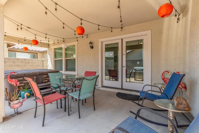 view of patio with a hot tub