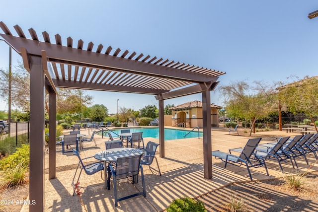 view of pool featuring a pergola and a patio