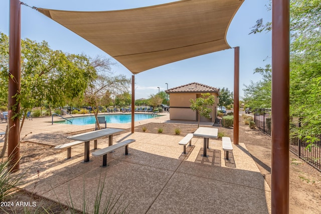 view of patio with a community pool