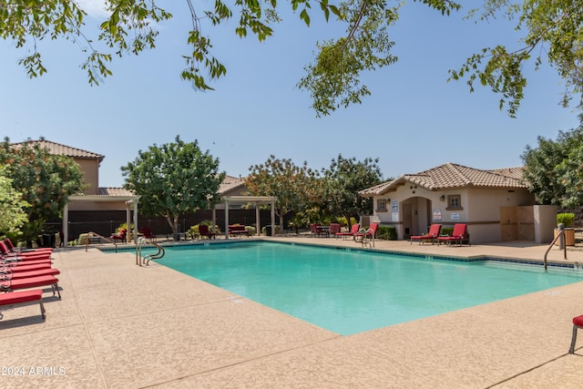 view of pool featuring a patio