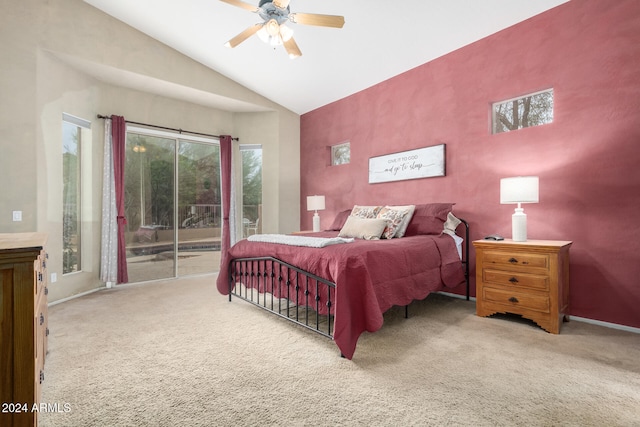 bedroom with access to outside, vaulted ceiling, carpet flooring, and ceiling fan