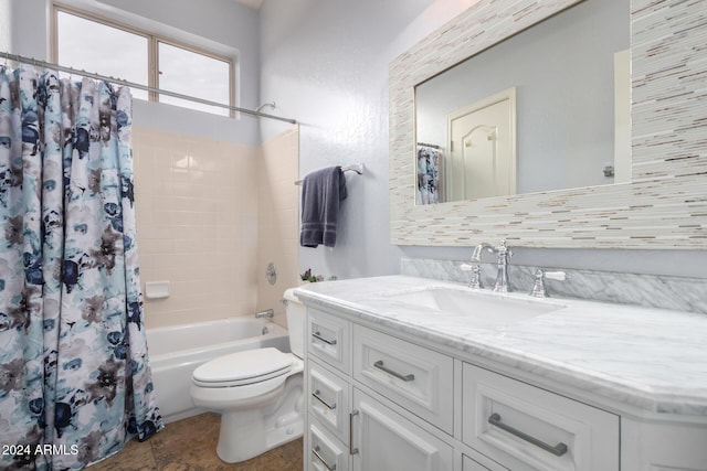 full bathroom with vanity, toilet, and shower / bathtub combination with curtain