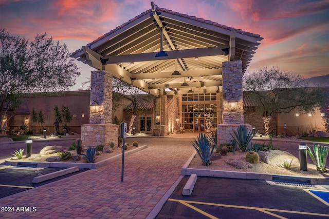 view of patio terrace at dusk