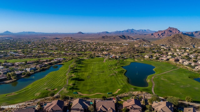 drone / aerial view with a water and mountain view