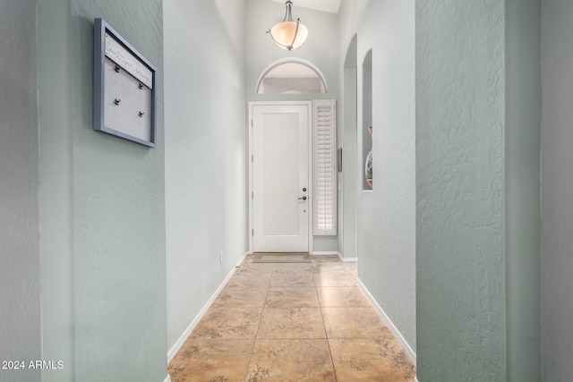 interior space with a towering ceiling