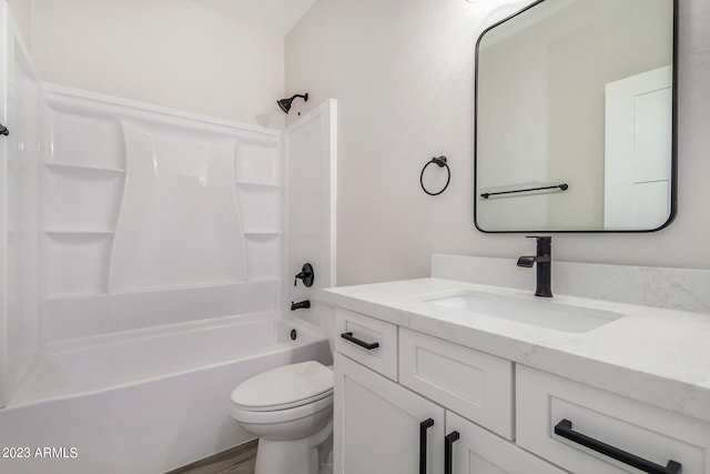 full bathroom featuring shower / washtub combination, vanity, and toilet