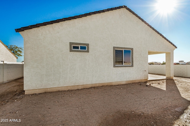 back of house featuring a patio area