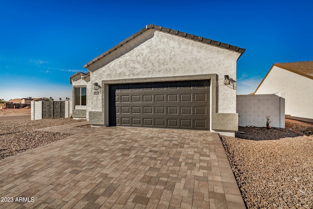 view of front of home with a garage