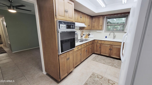 650 N 65th Way, Mesa, AZ 85205 - kitchen featuring oven, light tile patterned floors, ceiling fan, light countertops, and under cabinet range hood