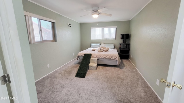 650 N 65th Way, Mesa, AZ 85205 - carpeted bedroom featuring ornamental molding, a ceiling fan, and baseboards