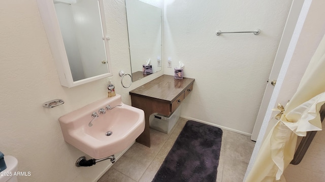 650 N 65th Way, Mesa, AZ 85205 - half bathroom with a sink and tile patterned flooring