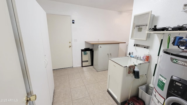 650 N 65th Way, Mesa, AZ 85205 - kitchen featuring water heater and light tile patterned floors