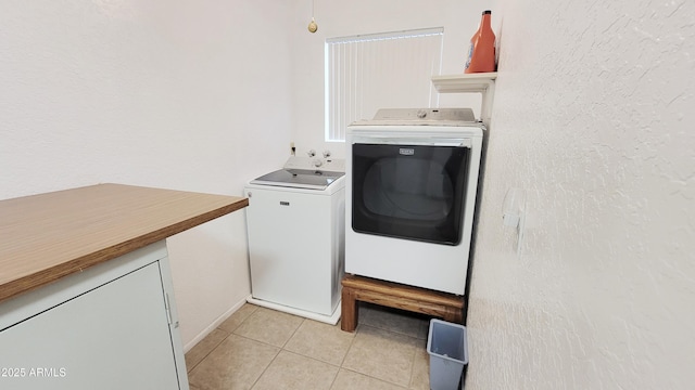 650 N 65th Way, Mesa, AZ 85205 - laundry room with washer and clothes dryer and light tile patterned floors