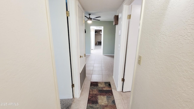 650 N 65th Way, Mesa, AZ 85205 - hallway with a textured wall and light tile patterned flooring