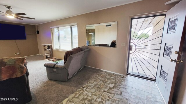 650 N 65th Way, Mesa, AZ 85205 - living area featuring ornamental molding, baseboards, and a ceiling fan