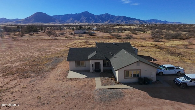 drone / aerial view with a mountain view