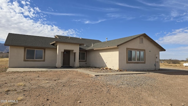 rear view of house featuring a patio area