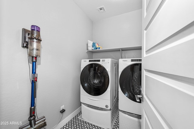 washroom featuring separate washer and dryer