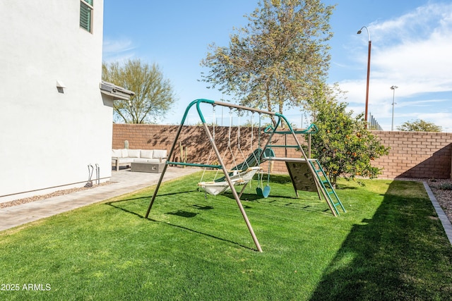 view of play area featuring a yard and an outdoor hangout area