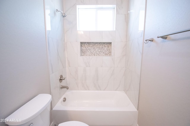 full bathroom with bathing tub / shower combination and toilet