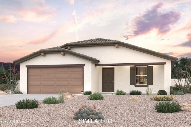 view of front of home with a garage