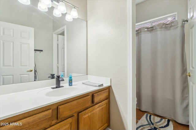 bathroom featuring vanity and walk in shower