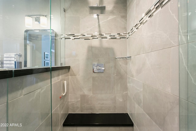 bathroom featuring an enclosed shower