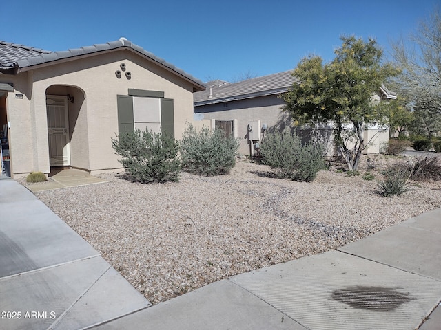 1875 N St Francis Pl, Casa Grande, AZ 85122 - exterior space featuring stucco siding and a tile roof